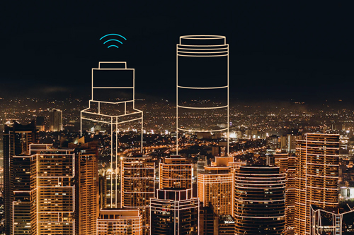 Nightscape with digital image of skyscrapers with signals coming out - a concept of smart tourism